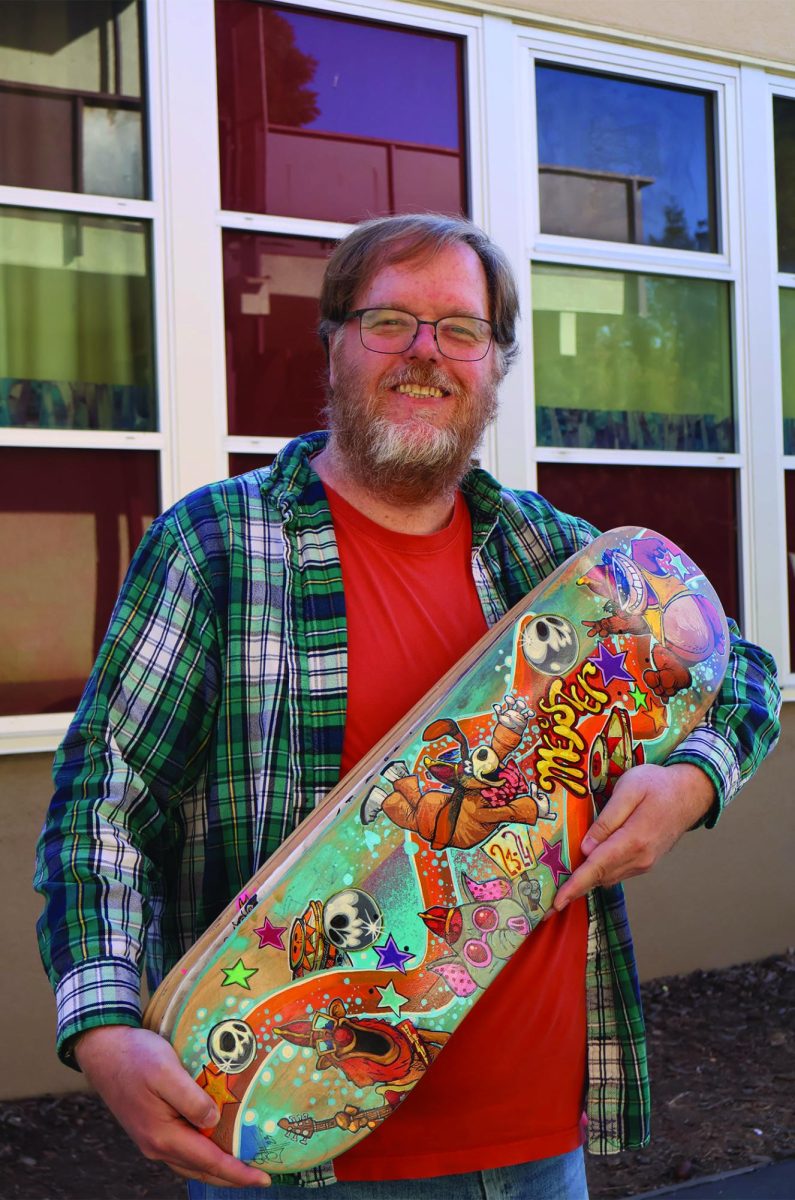 Mr Meister showing off this year's skateboard