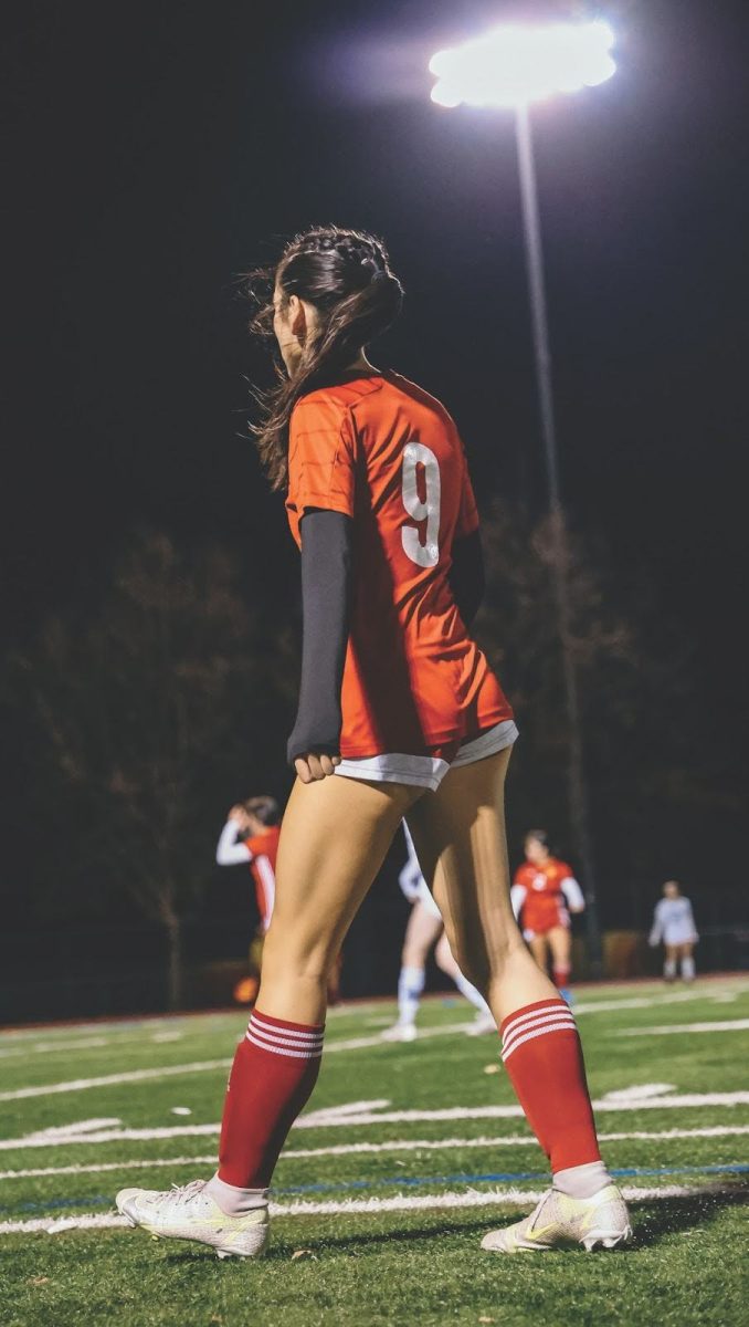 Bella Riggs (‘25) on the soccer field, photo by Zach Wyss (‘25).