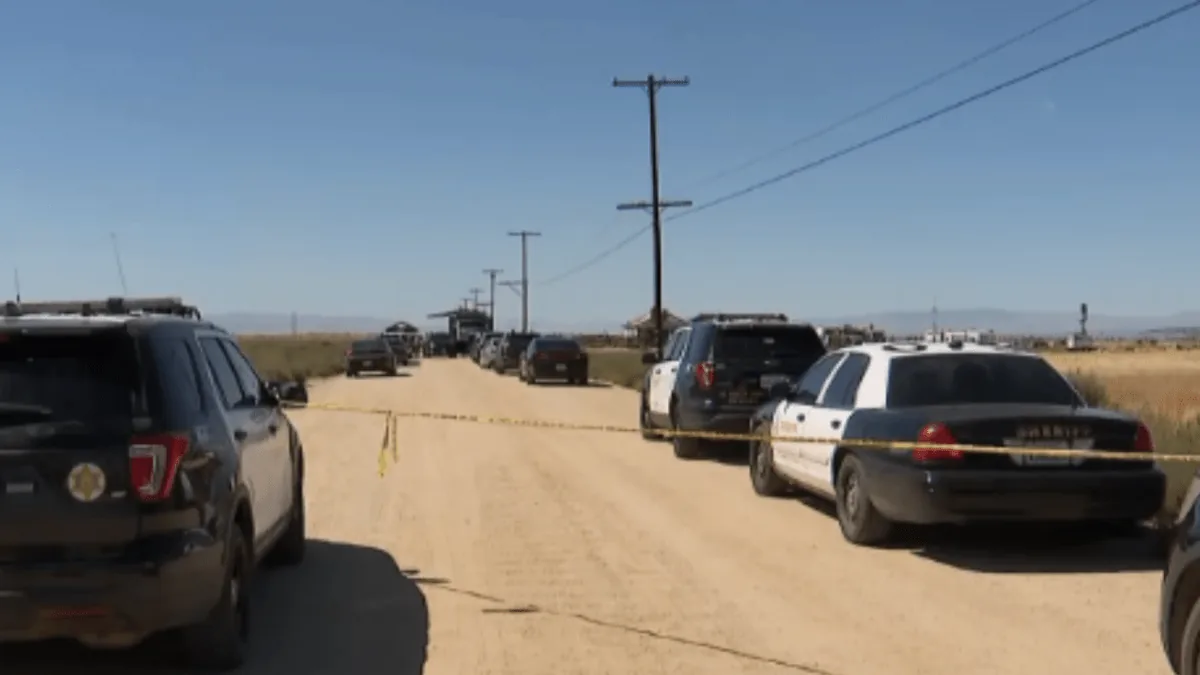 Sheriff’s investigators and forensic personnel searching a Lancaster property for buried human remains