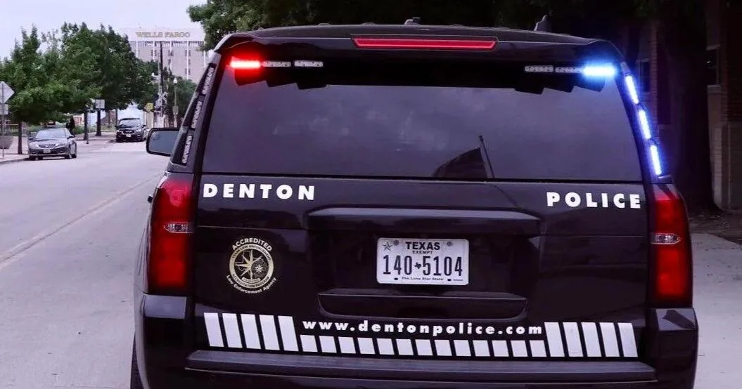 Denton police vehicle at night near a city park in Texas